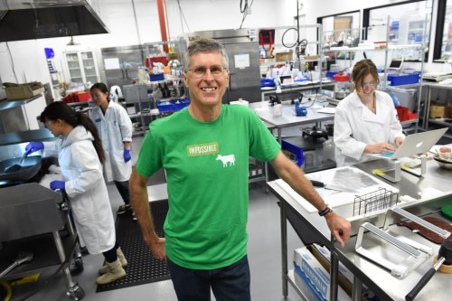 Patrick Brown in Impossible Foods’ laboratory [Source: Wall Street Journal]